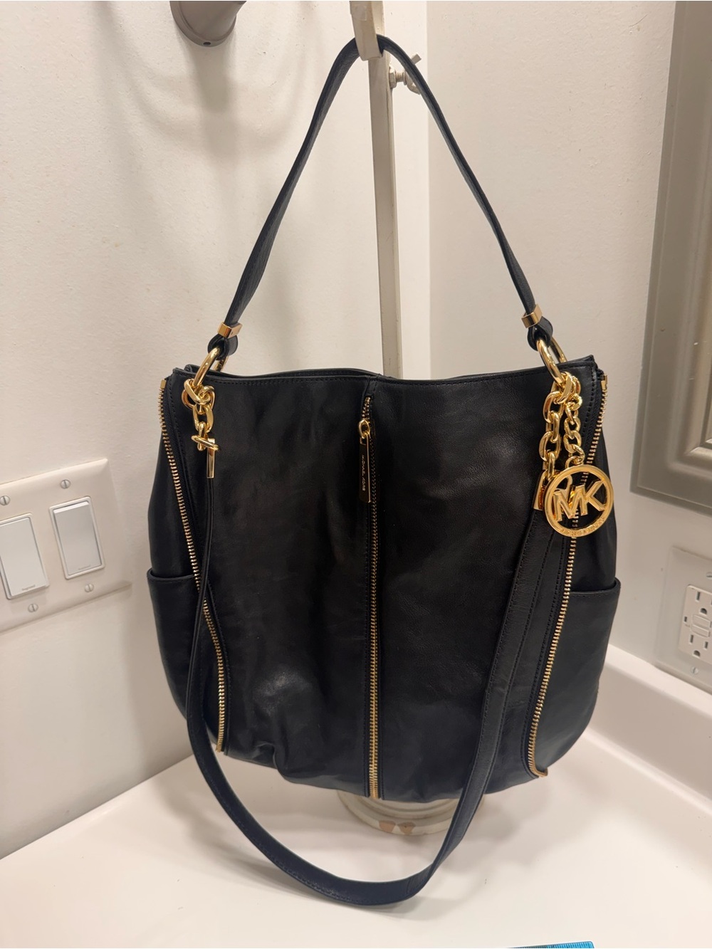 MK Michale Kors Black Hobo with Gold hardware. Fierce!